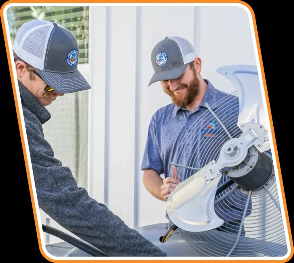 Reliable Ducts technician installing a new heating system.