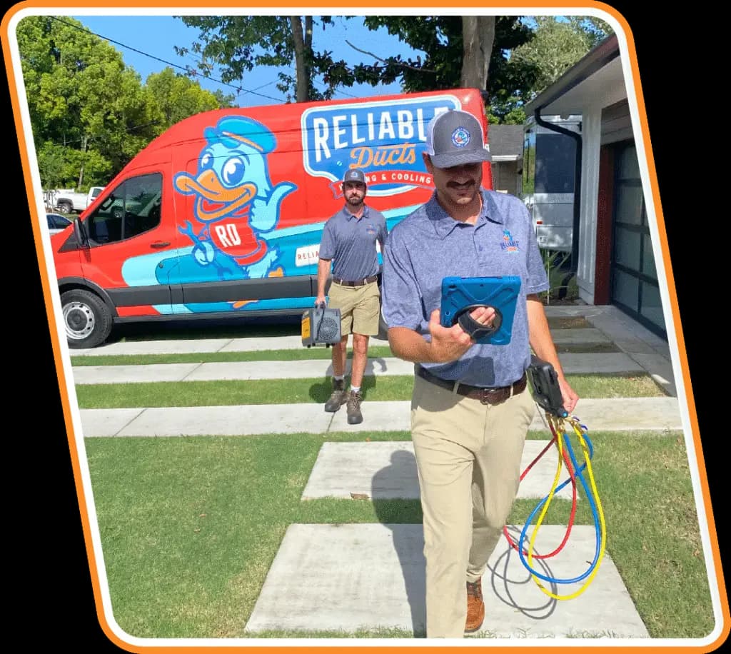 Reliable Ducts technician servicing a heating system in Jacksonville, FL