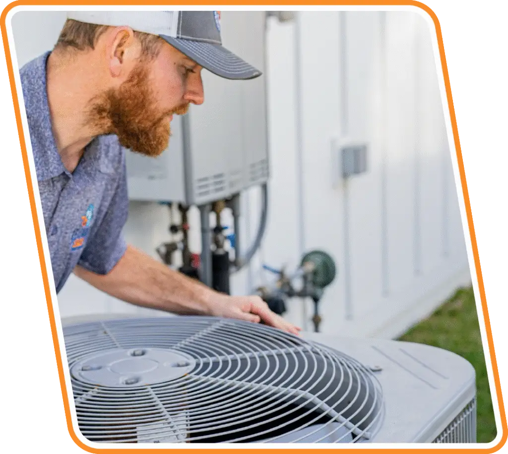 Technician checking a heating system during a routine maintenance visit in Jacksonville