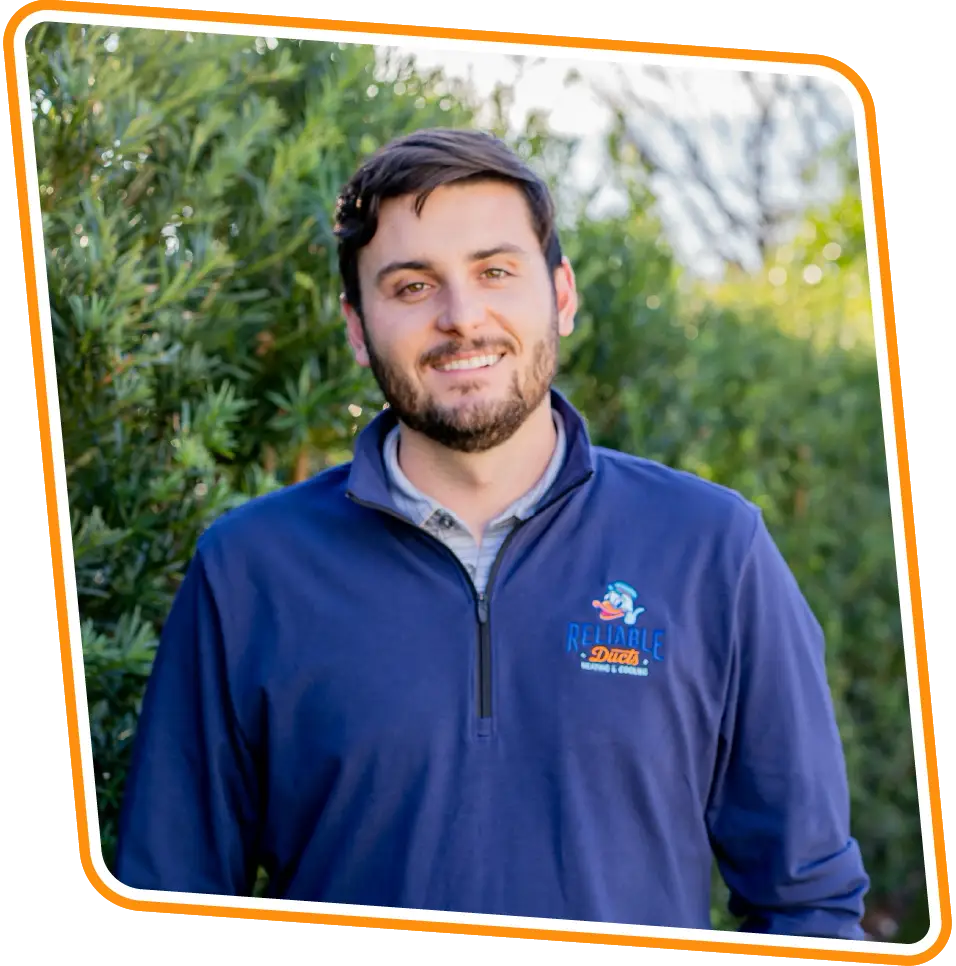 Reliable Ducts Heating & Cooling technician smiling outdoors in Ponte Vedra Beach, FL