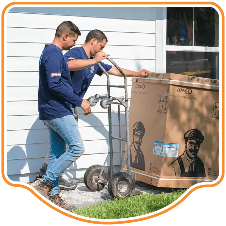 Reliable Ducts Heating & Cooling technicians delivering and installing a new air conditioning unit in Yulee, FL.